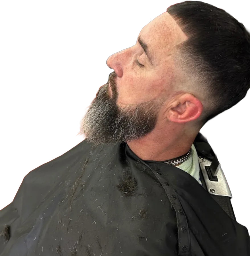 Low fade with a sculpted full beard blend by Mr. P
