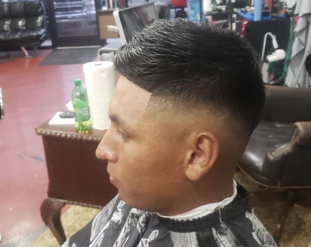 Textured crop with a clean skin fade by Mr. P