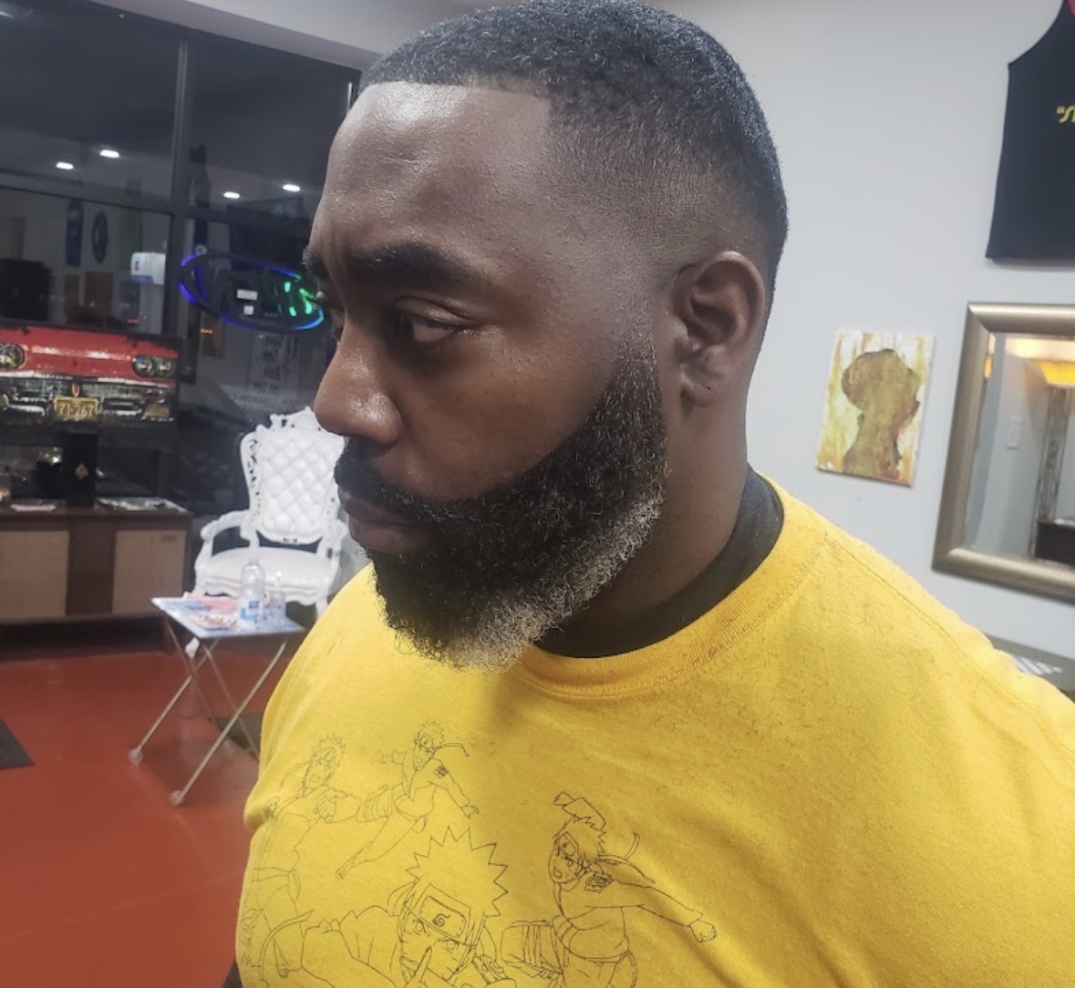 Low fade with a sculpted full beard blend by Mr. P