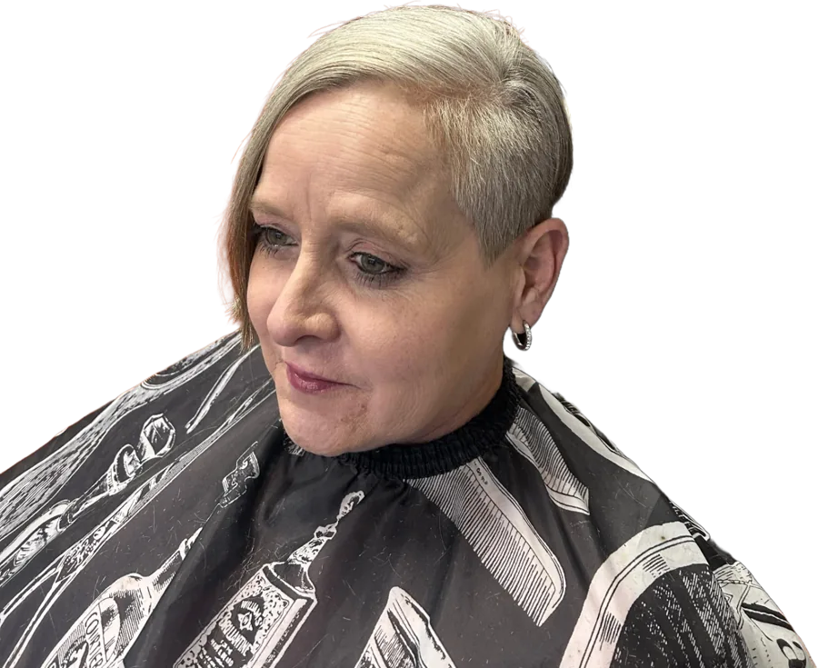 Blonde pixie cut with a clean tapered side by Mr. P