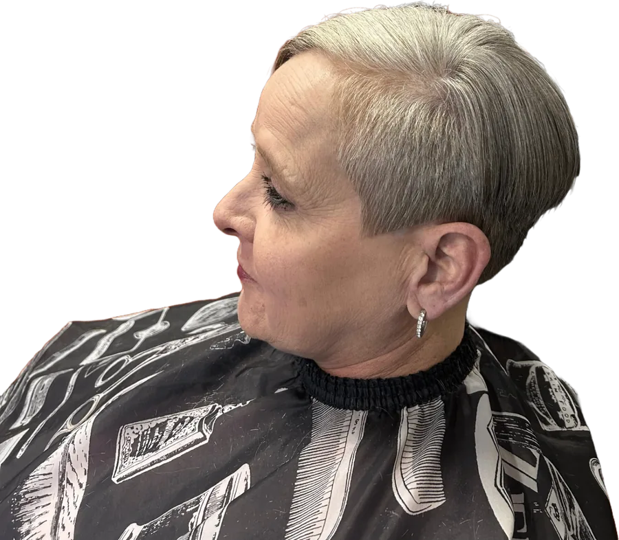 Short tapered pixie cut on a woman by Mr. P