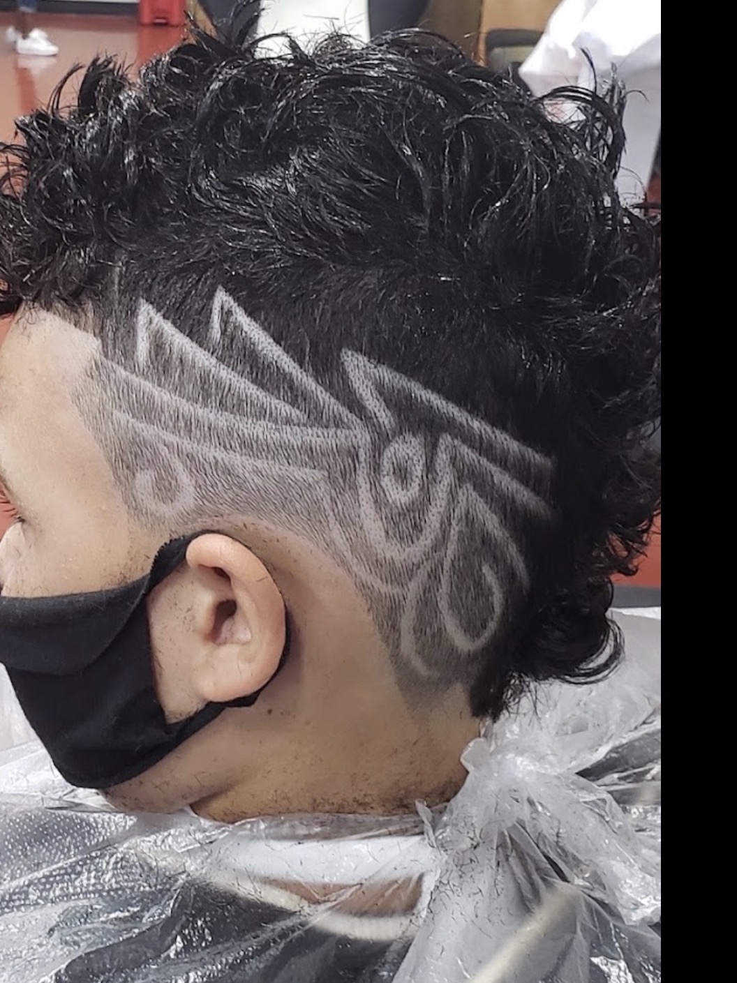 Freestyle hair design shaved into the side by Mr. P